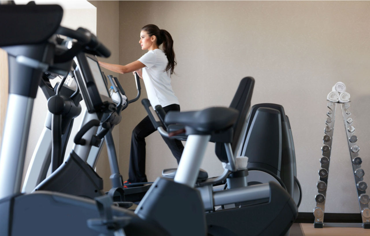 Four Seasons Hotel Riyadh Exterior photo A woman on a recumbent bike